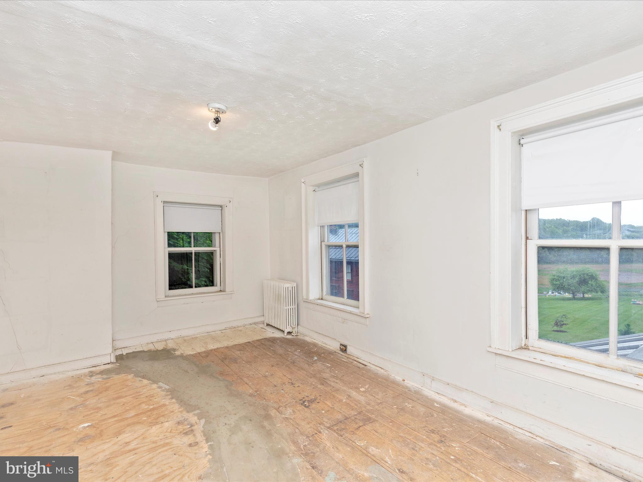 3204 Uniontown Road Westminster, MD 21158 - Photo 43 of 51 a view of an empty room with a window