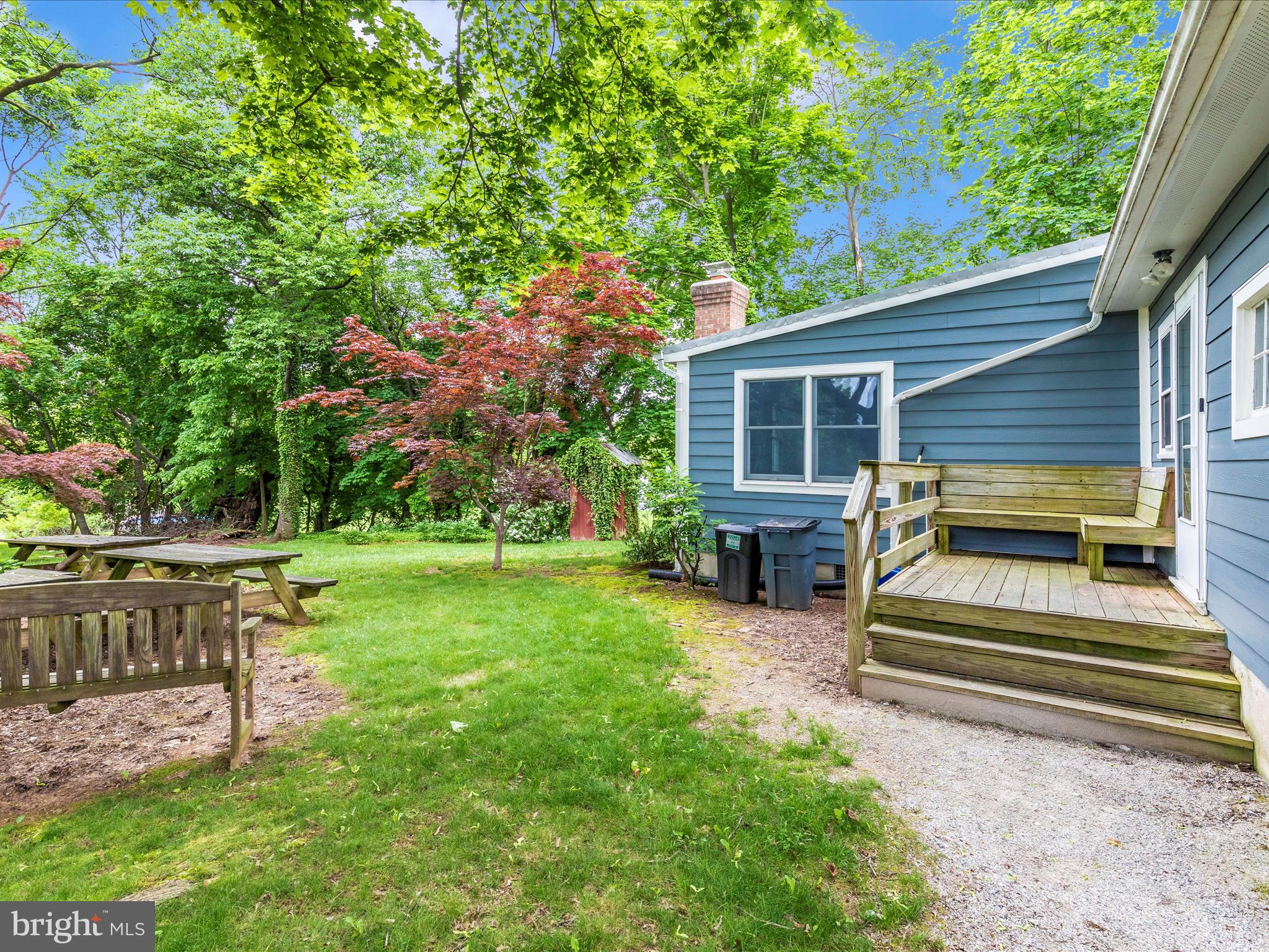 3204 Uniontown Road Westminster, MD 21158 - Photo 6 of 51 a view of a chair and table in the garden