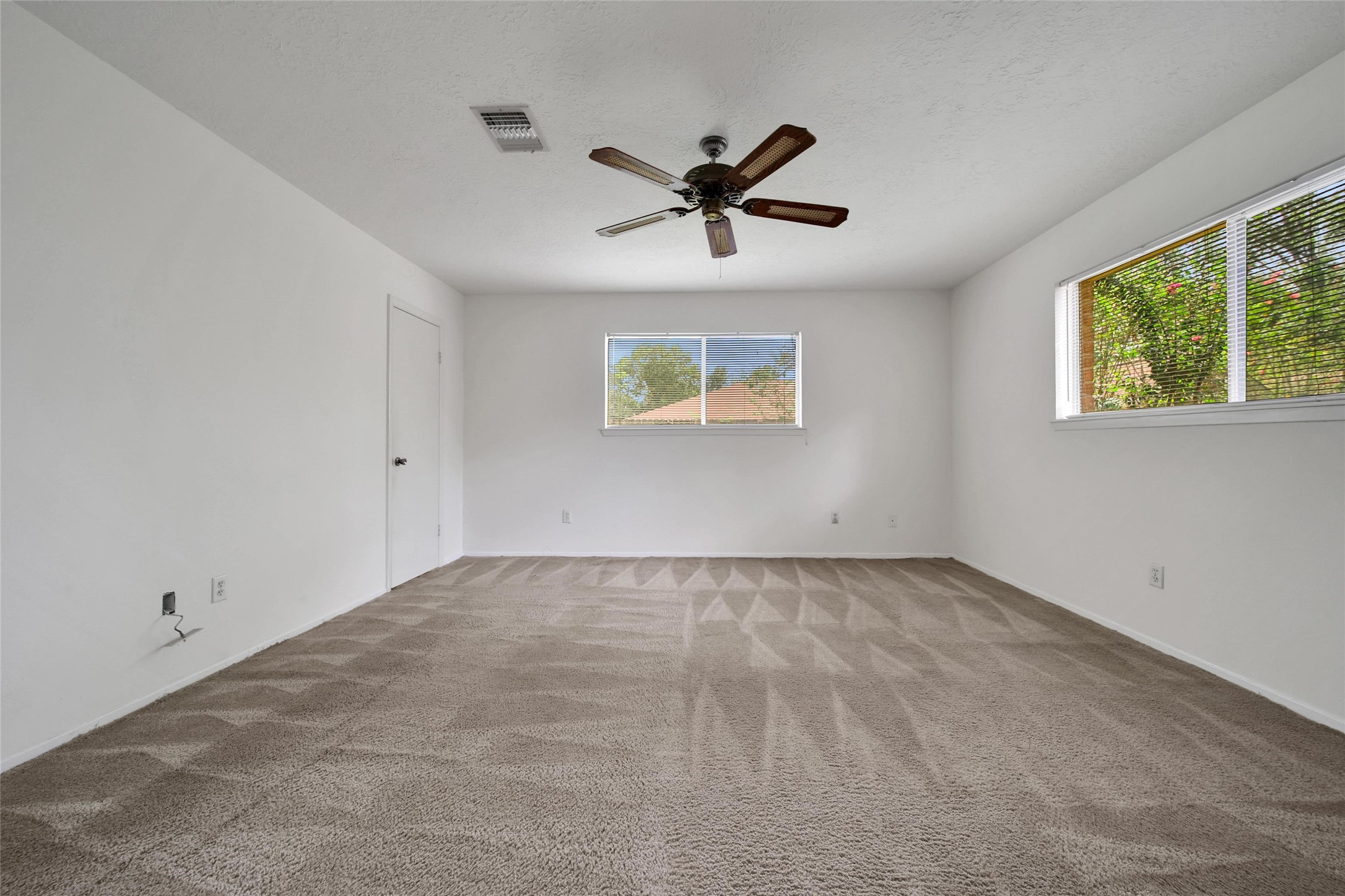 1712 Lindy Lane Conroe, TX 77301 - Photo 11 of 20 a view of an empty room with a window