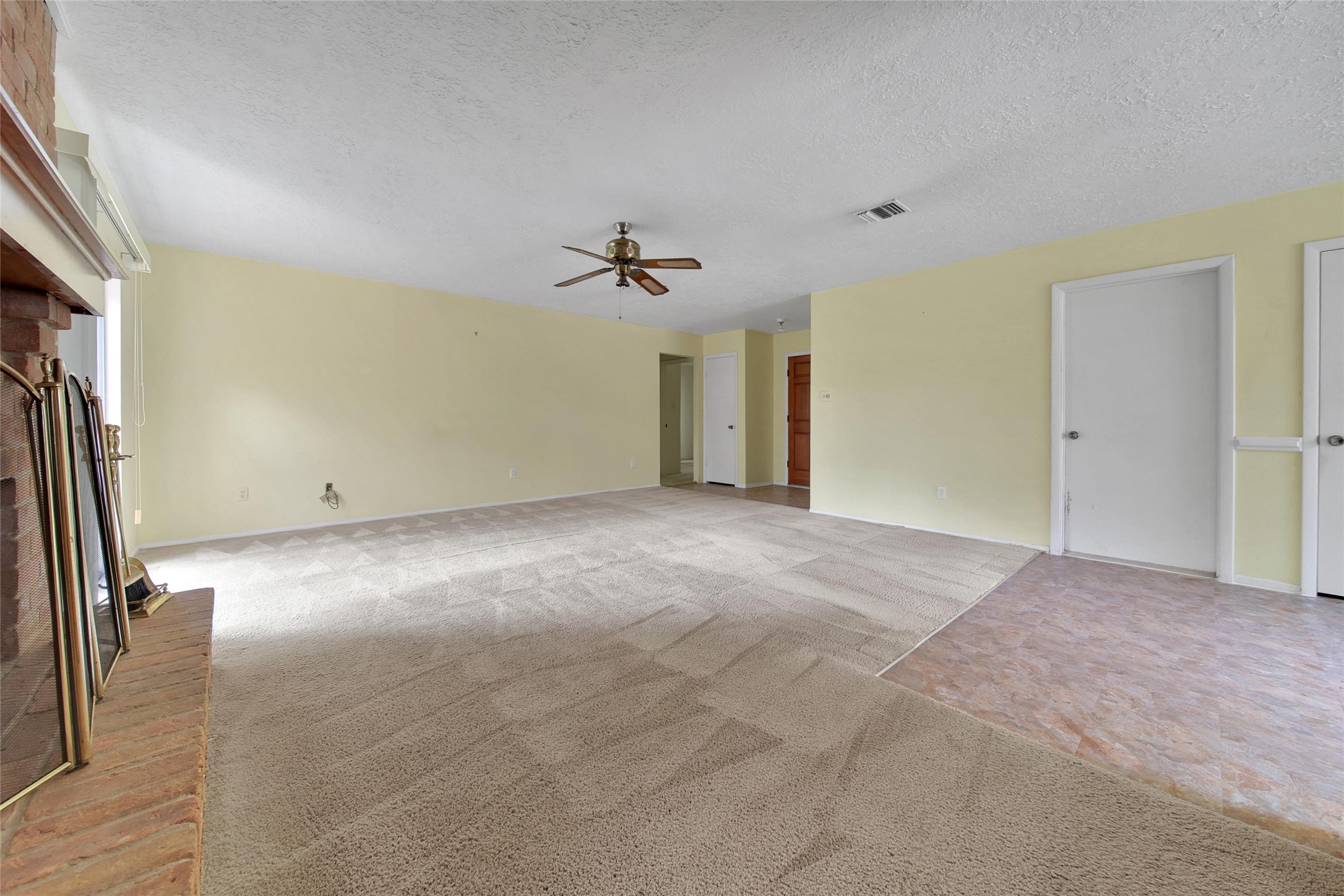 1712 Lindy Lane Conroe, TX 77301 - Photo 6 of 20 a view of a livingroom with a ceiling fan