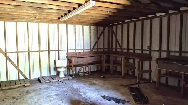a view of a chairs and table in a patio