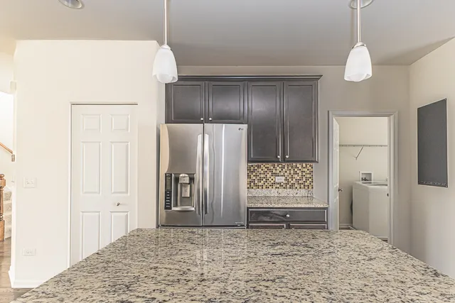 a view of room with a ceiling fan and window
