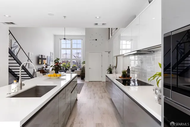 a view of a kitchen with washer and dryer