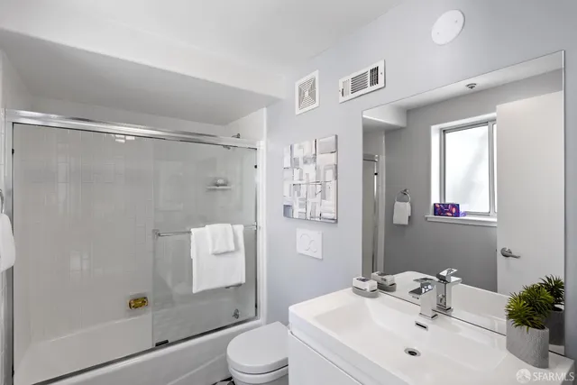 a kitchen with a stove and a microwave