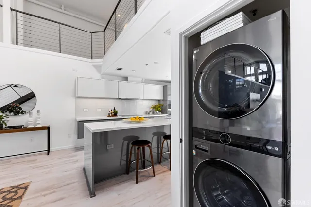 a kitchen with a sink a counter and cabinets