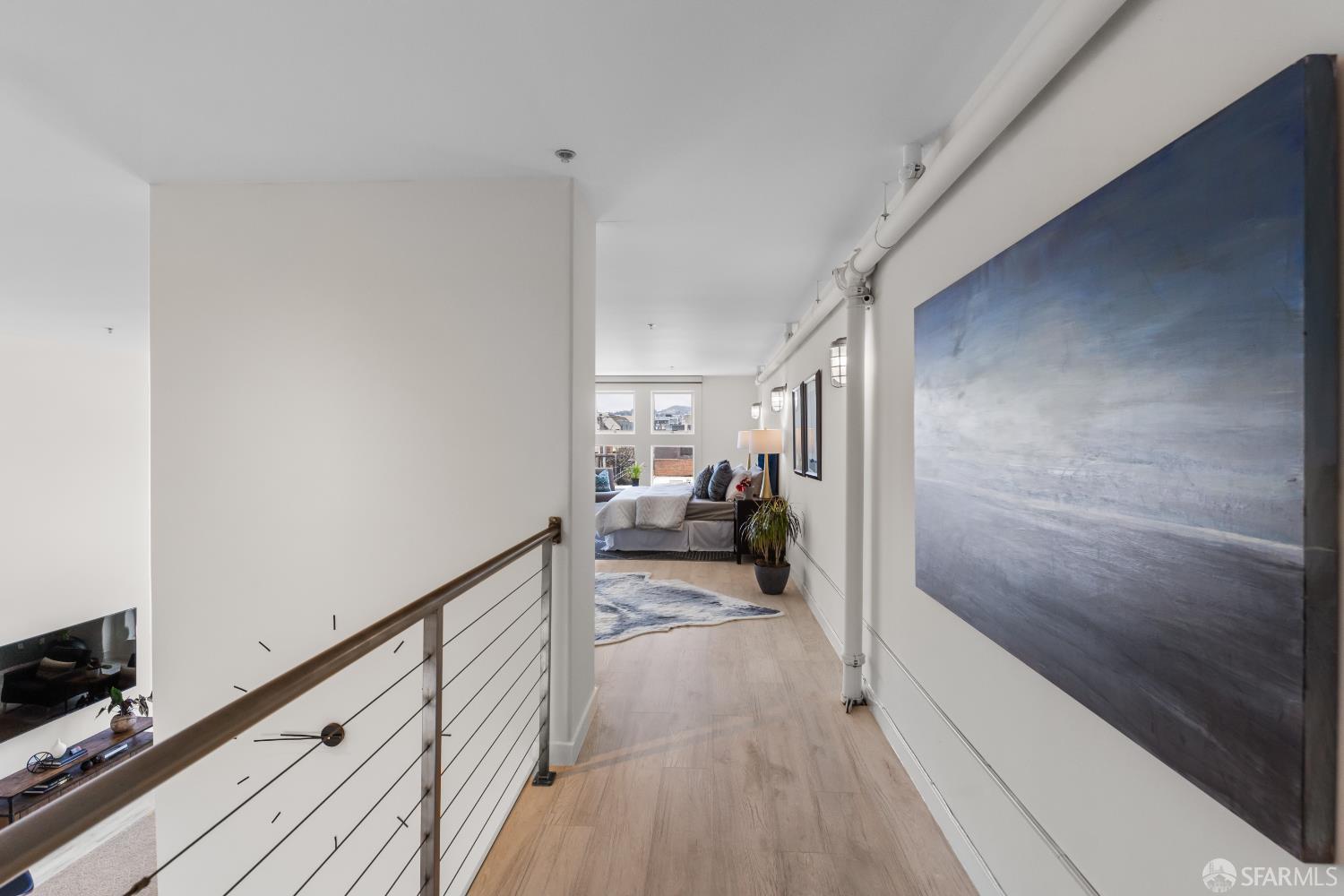 229 8th Street, Unit 3 San Francisco, CA 94103 - Photo 41 of 61 a view of a hallway view with couch