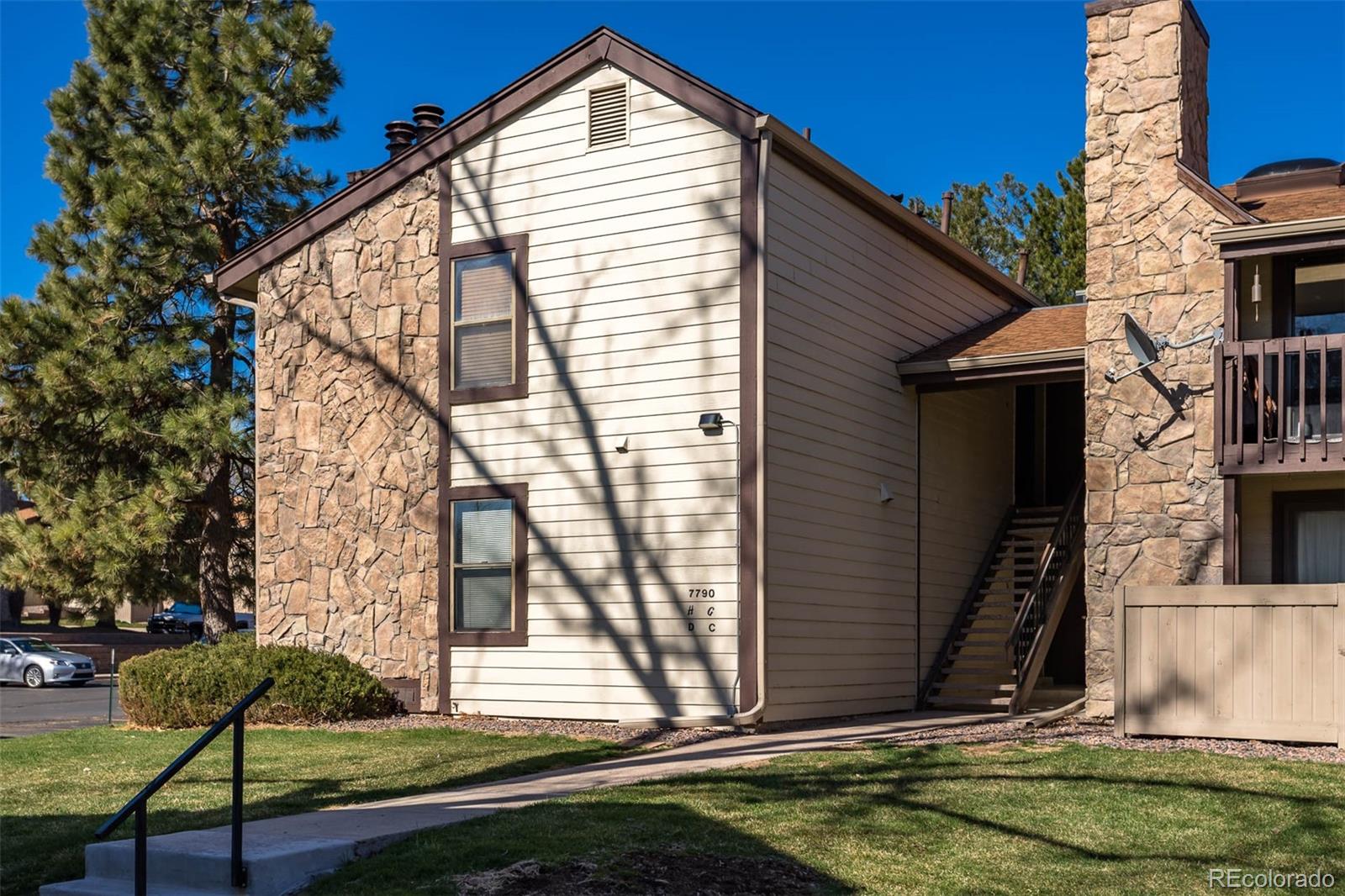 7790 West 87th Drive, Unit D Arvada, CO 80005 - Photo 1 of 19 a view of house with yard