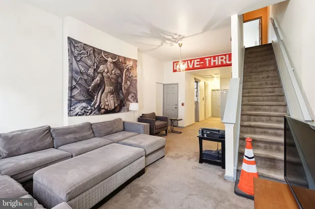 a living room with furniture and a couch