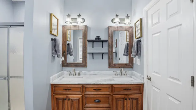 a white bath tub sitting next to a window