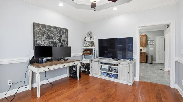a balcony with table and chairs