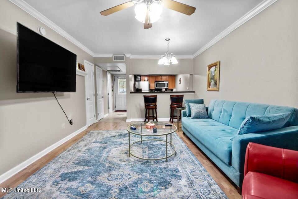 3230 Cumberland Road, Unit 70 Ocean Springs, MS 39564 - Photo 5 of 30 Cumberland #70 living room & kitchen & f