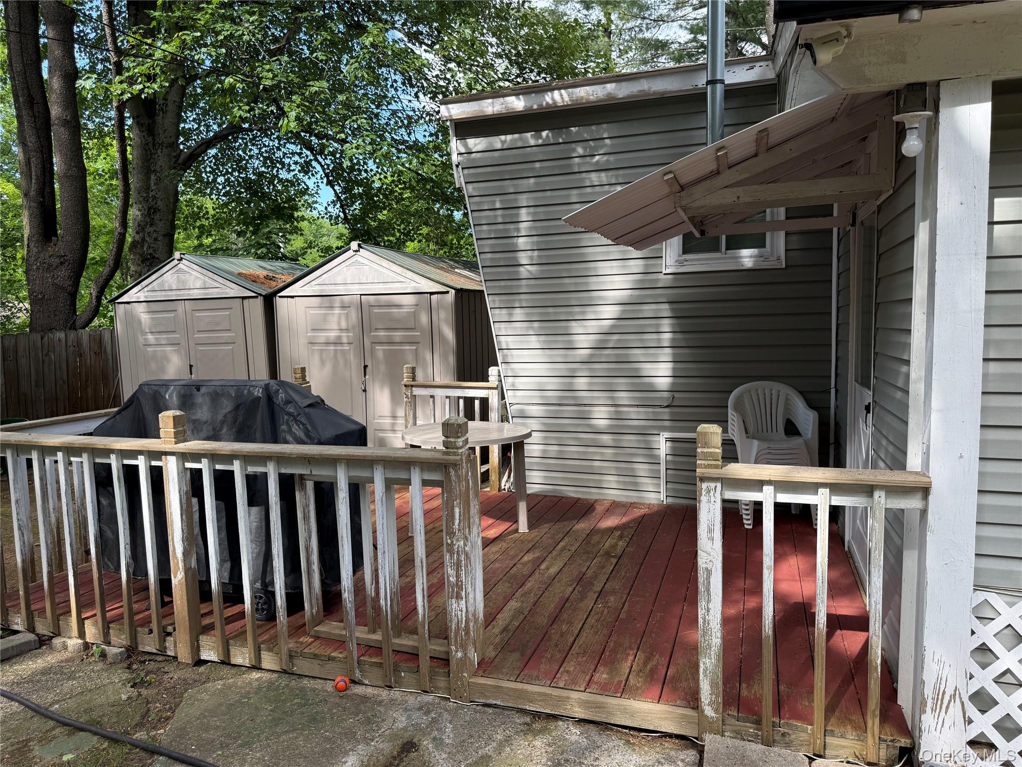 136 Quaker Rd Park Pomona, NY 10970 - Photo 6 of 24 Outdoor wood deck with railing