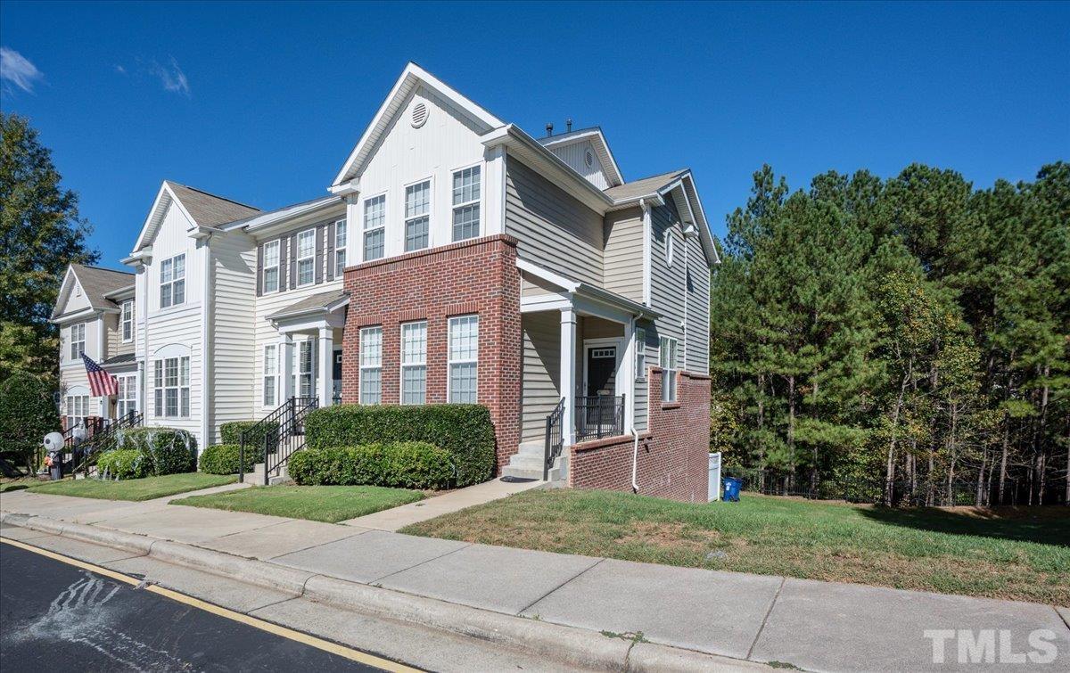 7604 Canvas Art Terrace Raleigh, NC 27617 - Photo 2 of 20 a front view of a house with garden