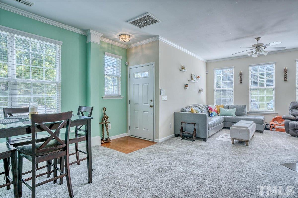 7604 Canvas Art Terrace Raleigh, NC 27617 - Photo 3 of 20 a living room with furniture and a window