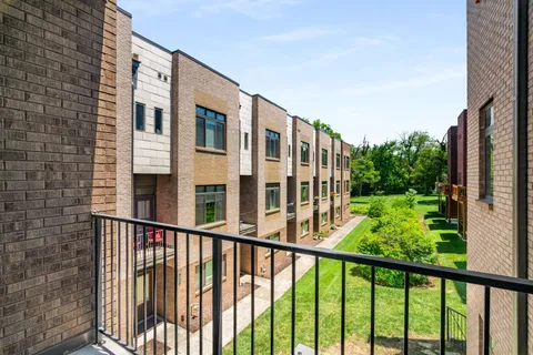 a view of a building from a balcony
