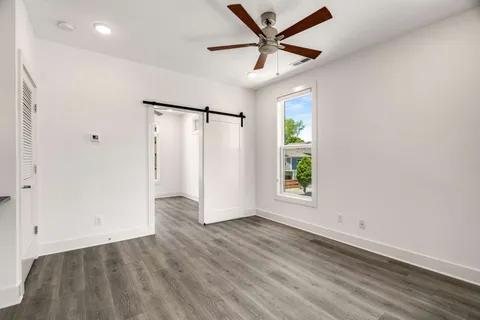 a view of entryway with wooden floor