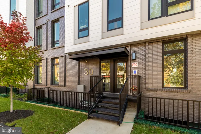 a view of a building with glass door and glass door