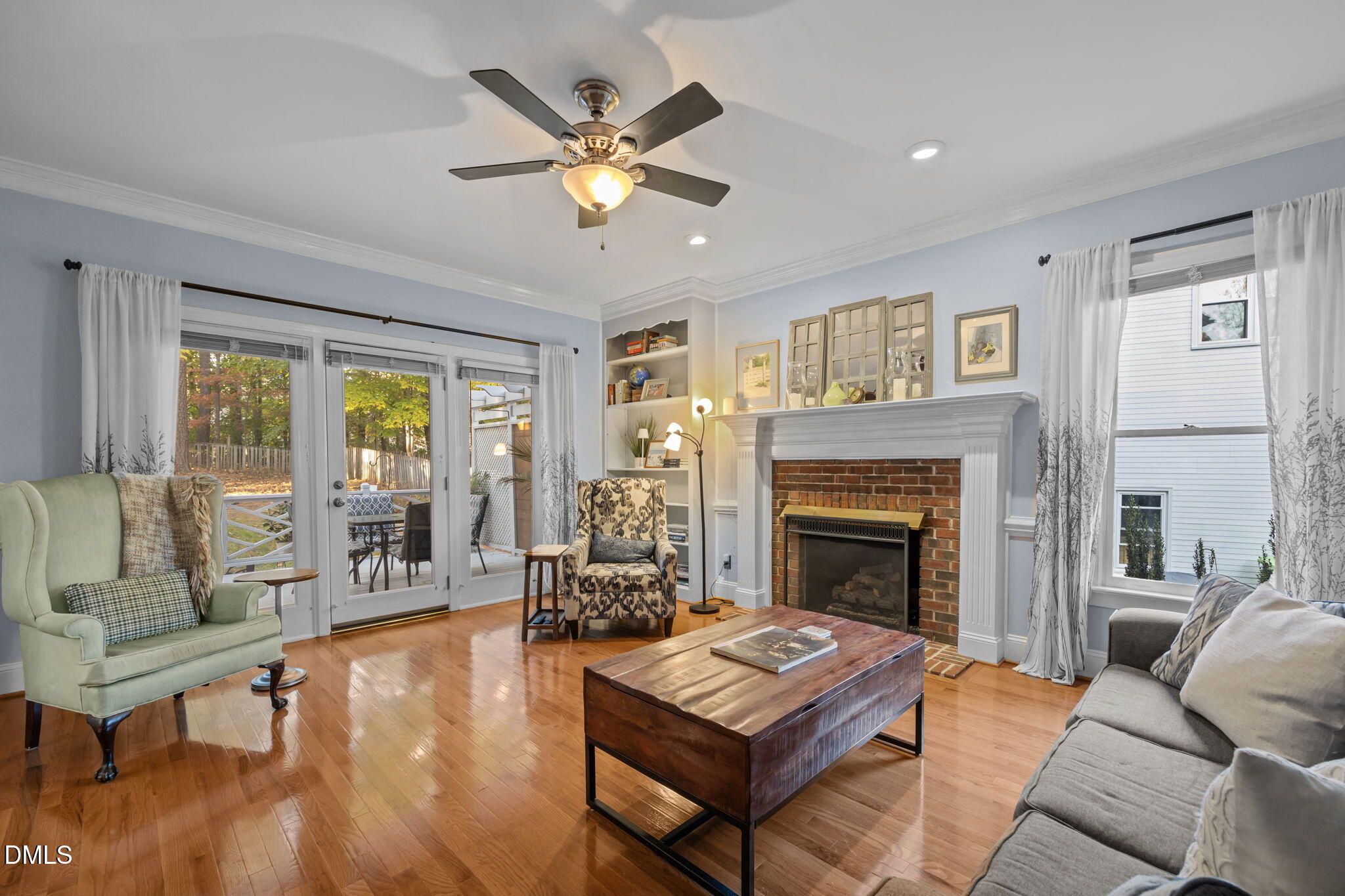 4304 Omni Place Raleigh, NC 27613 - Photo 21 of 58 a living room with furniture and a fireplace