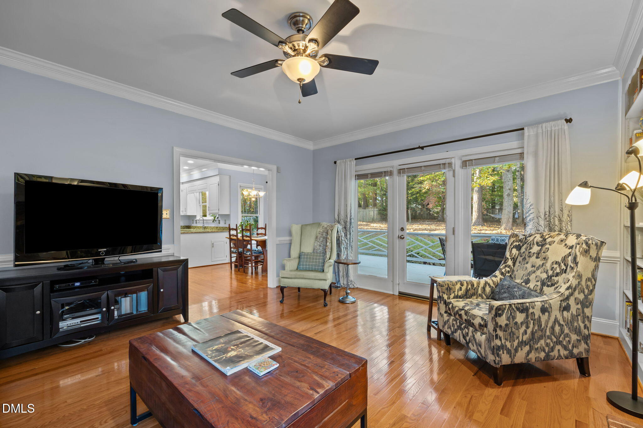 4304 Omni Place Raleigh, NC 27613 - Photo 23 of 58 a living room with furniture and a flat screen tv