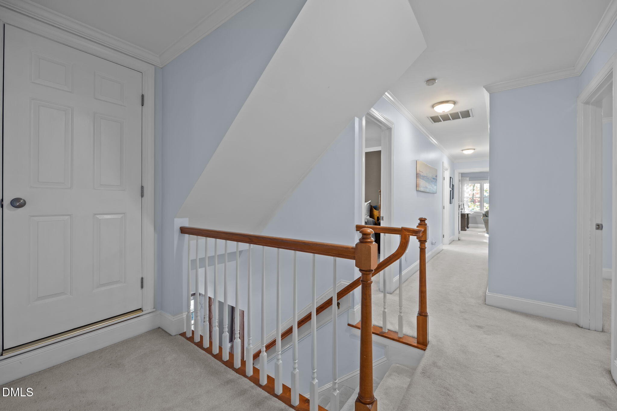 4304 Omni Place Raleigh, NC 27613 - Photo 25 of 58 a view of a hallway with stairs