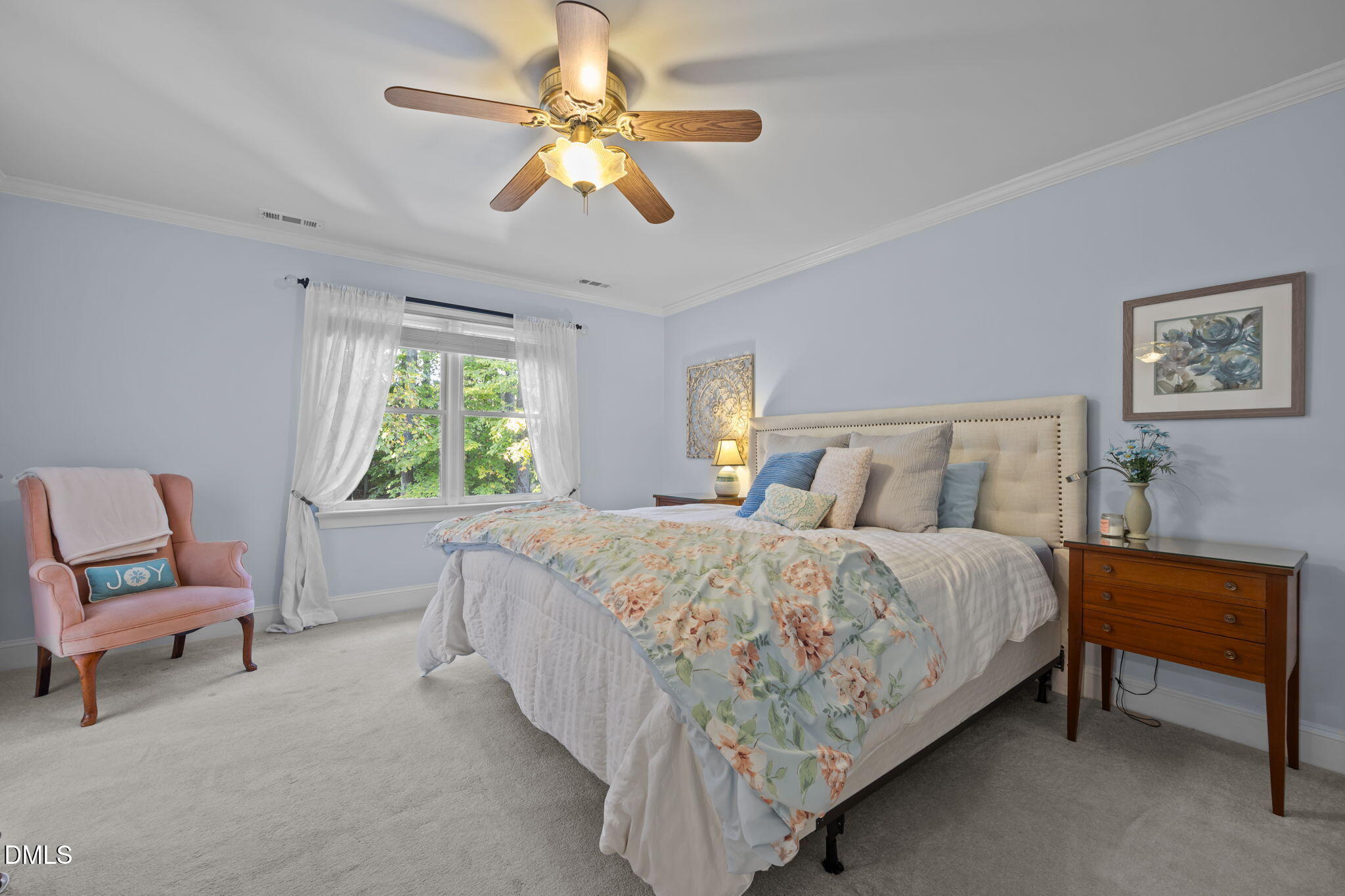 4304 Omni Place Raleigh, NC 27613 - Photo 26 of 58 a bed room with a bed and a chair