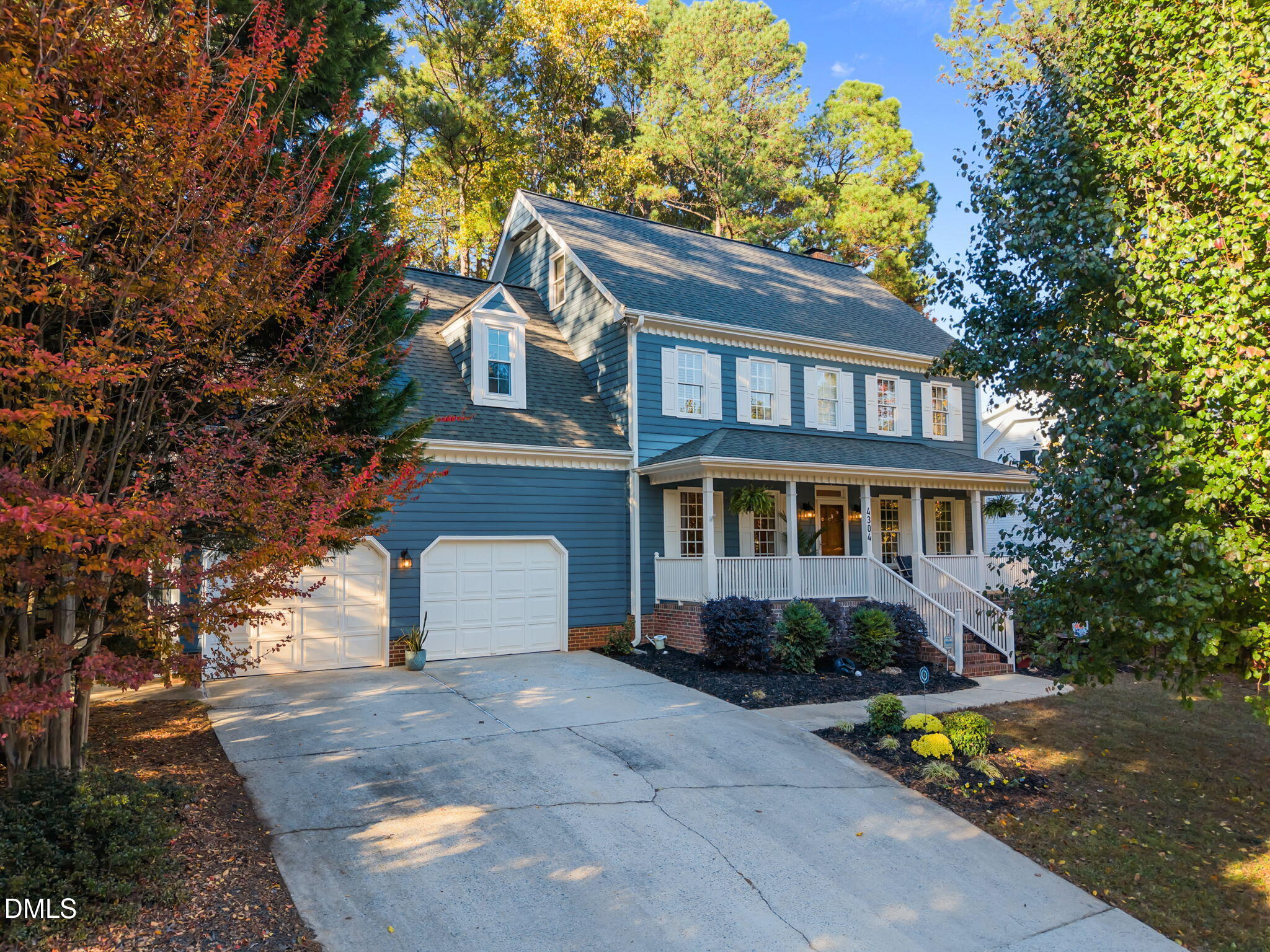 4304 Omni Place Raleigh, NC 27613 - Photo 3 of 58 a front view of a house with garden