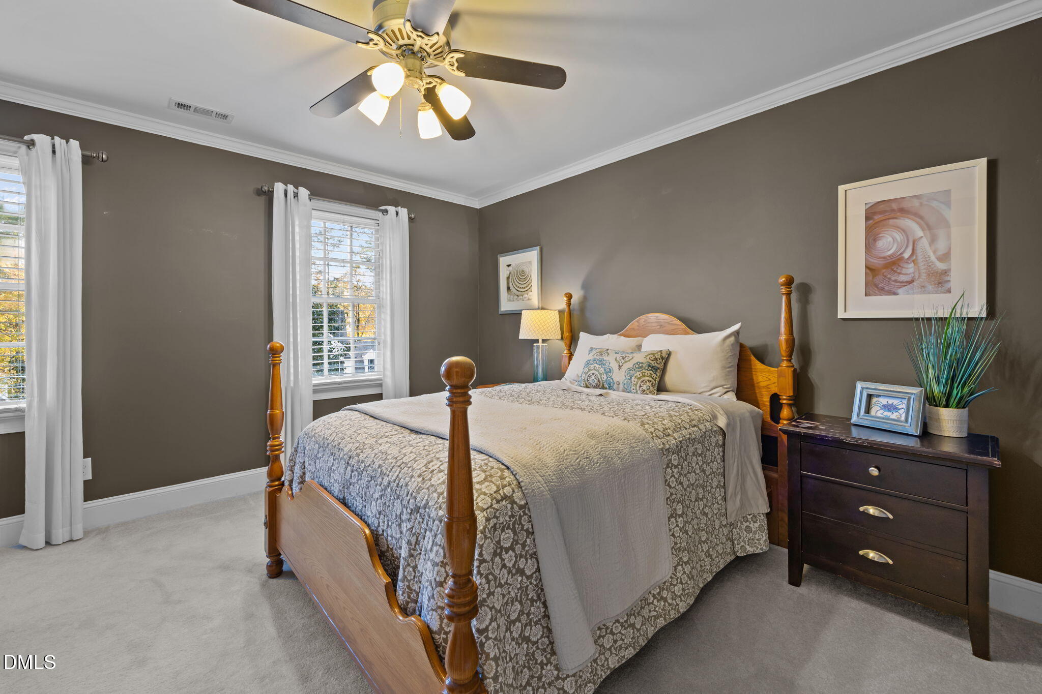 4304 Omni Place Raleigh, NC 27613 - Photo 34 of 58 a bedroom with a bed and a window