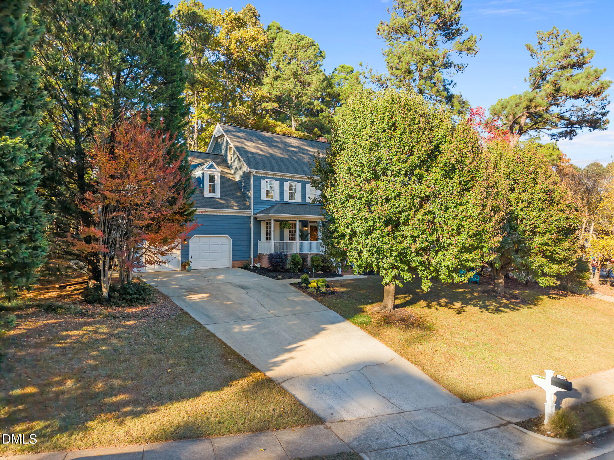 4304 Omni Place Raleigh, NC 27613 - Photo 4 of 58 a front view of a house with a yard