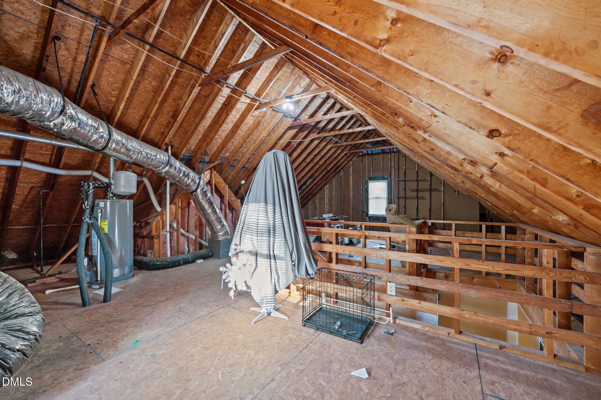 4304 Omni Place Raleigh, NC 27613 - Photo 42 of 58 a view of an empty room with wooden floor