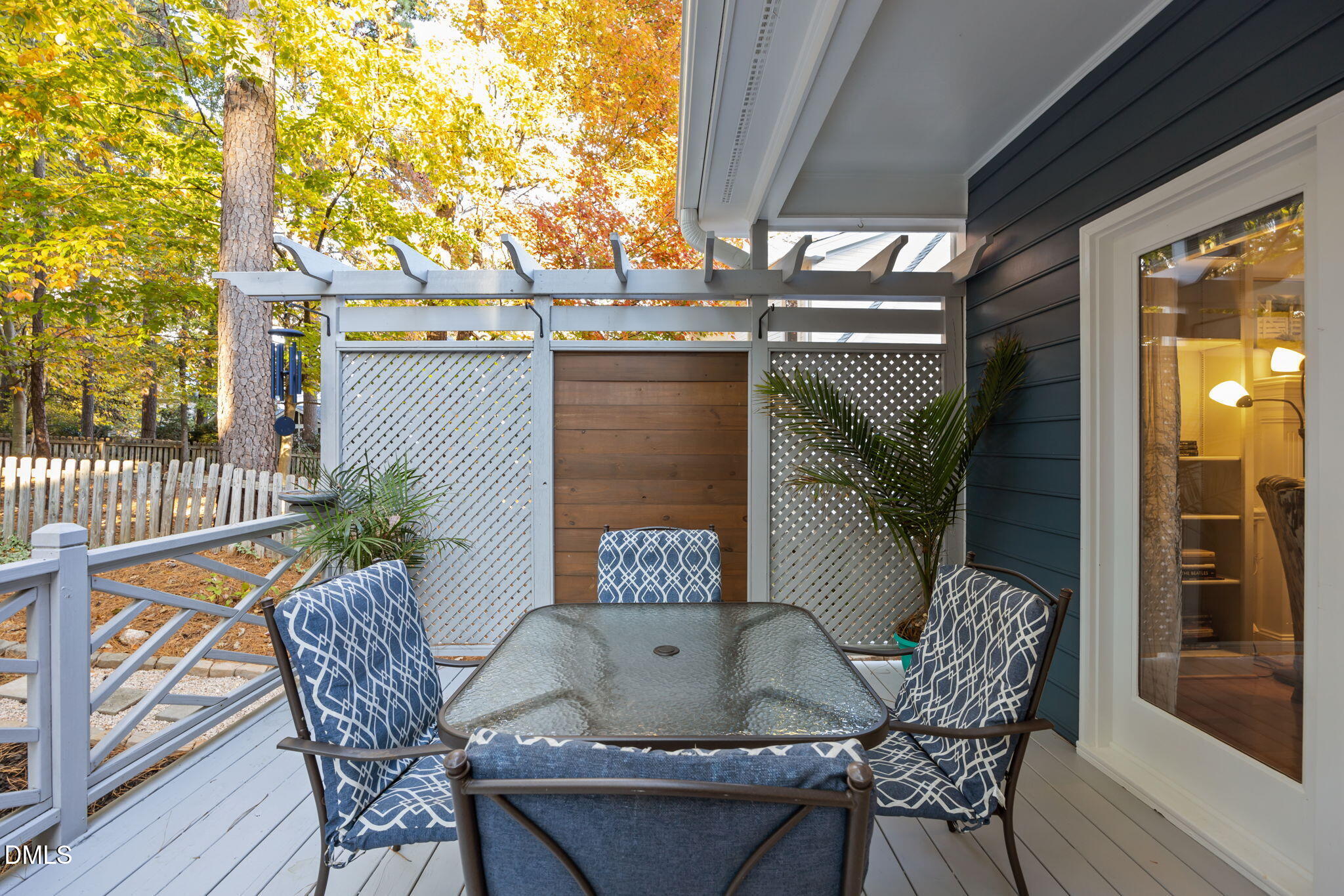4304 Omni Place Raleigh, NC 27613 - Photo 43 of 58 a view of outdoor seating space with furniture and wooden floor