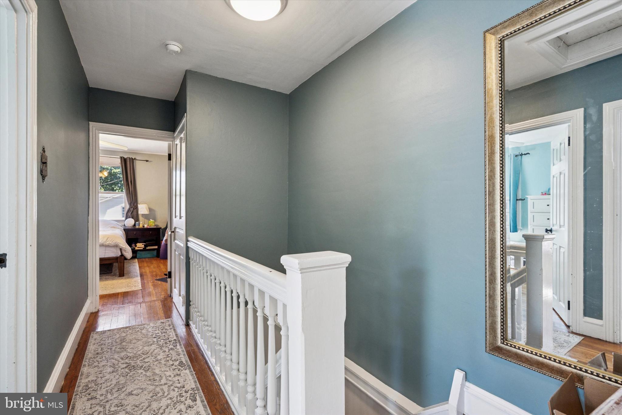 121 Conway Avenue Narberth, PA 19072 - Photo 11 of 27 a view of a hallway with a livingroom and furniture