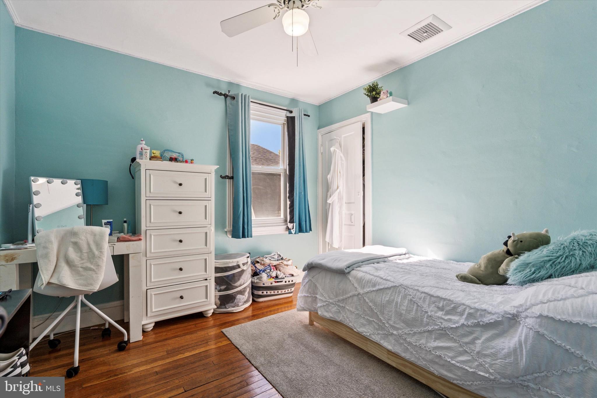 121 Conway Avenue Narberth, PA 19072 - Photo 13 of 27 a bedroom with a bed and a dresser