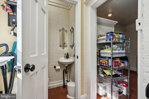 a room with furniture and a book shelf