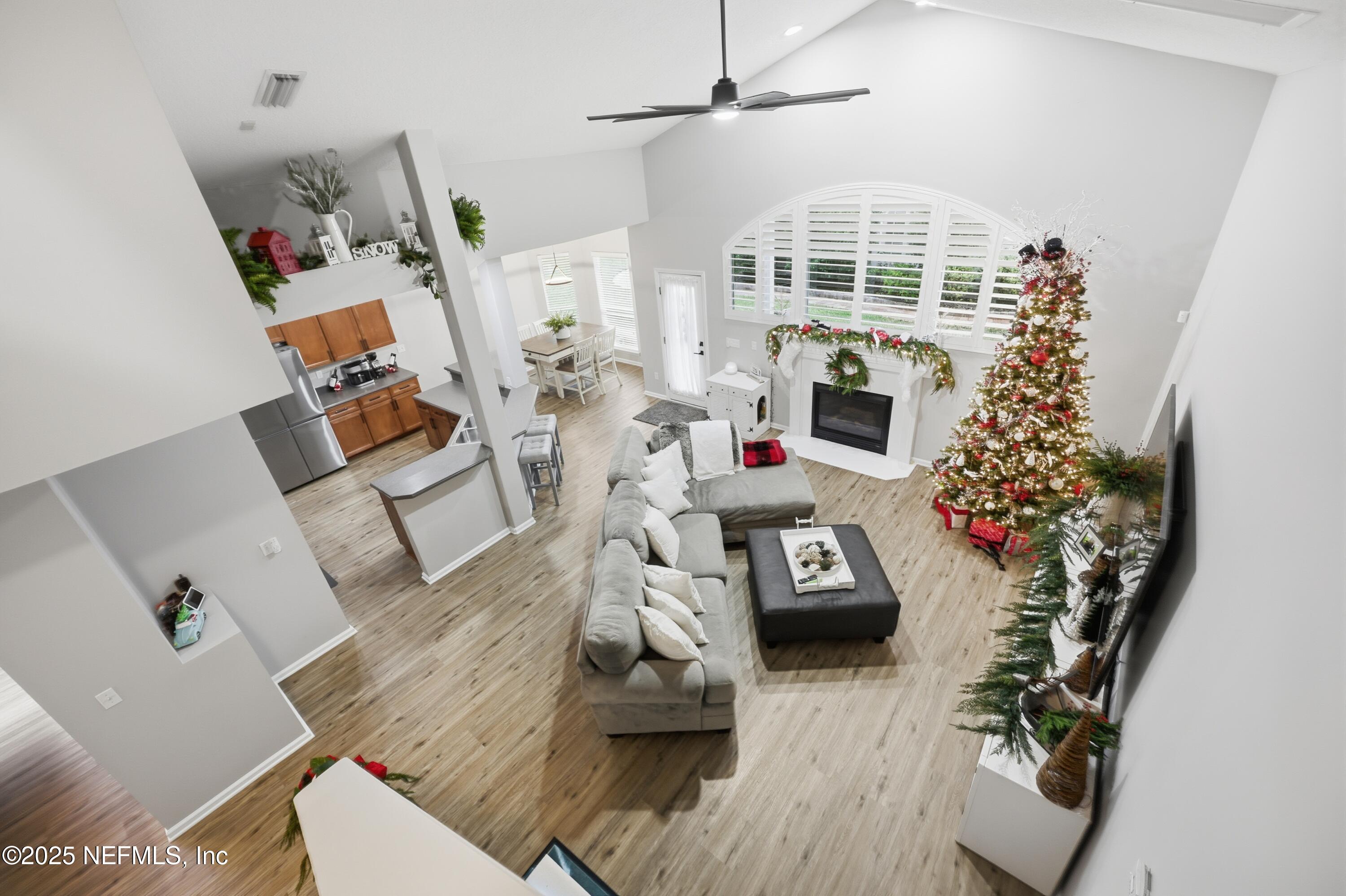 2301 Country Side Drive Fleming Island, FL 32003 - Photo 34 of 58 wooden floor view with living room and furniture