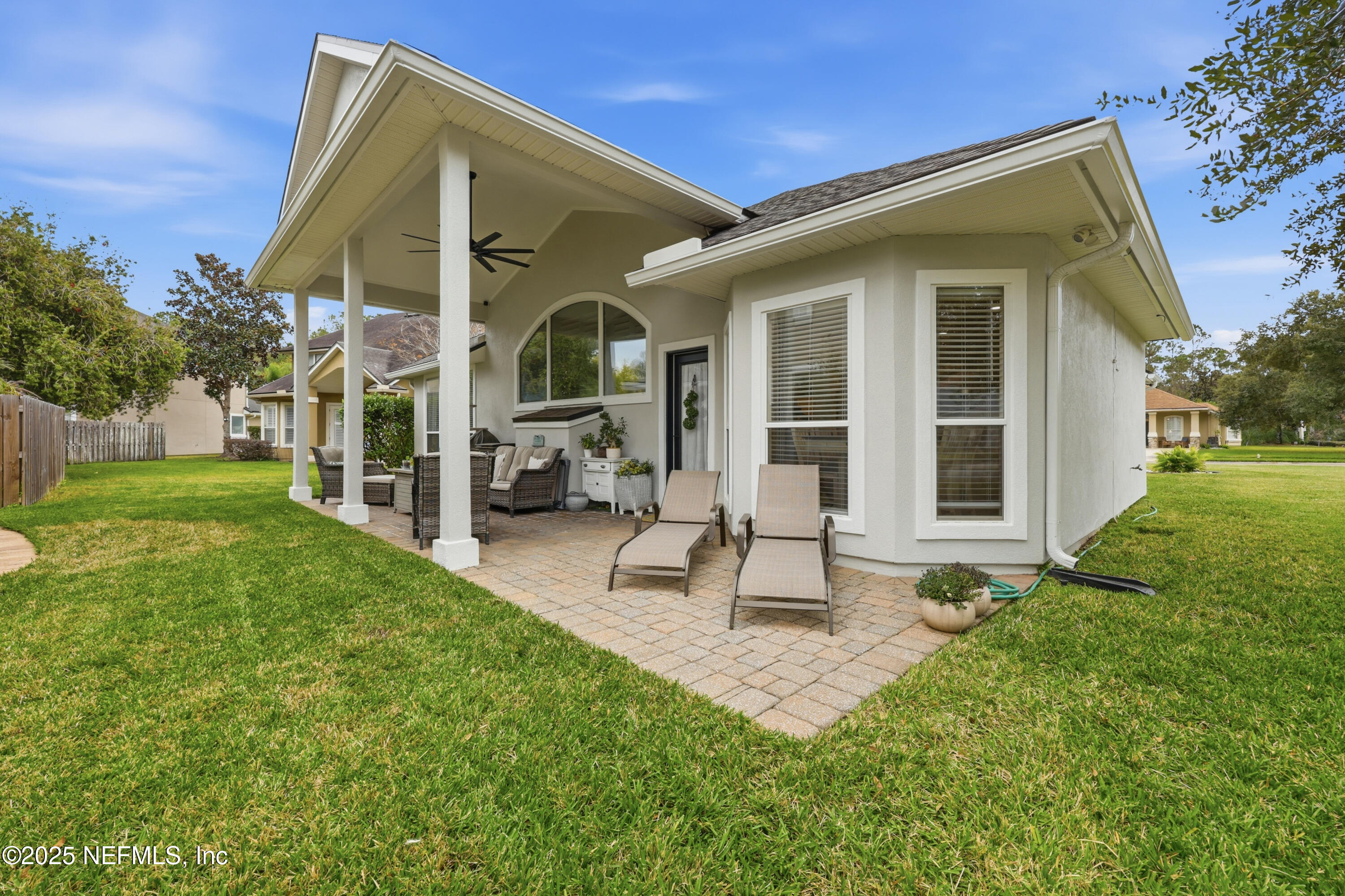 2301 Country Side Drive Fleming Island, FL 32003 - Photo 36 of 58 a view of a house with backyard and a garden
