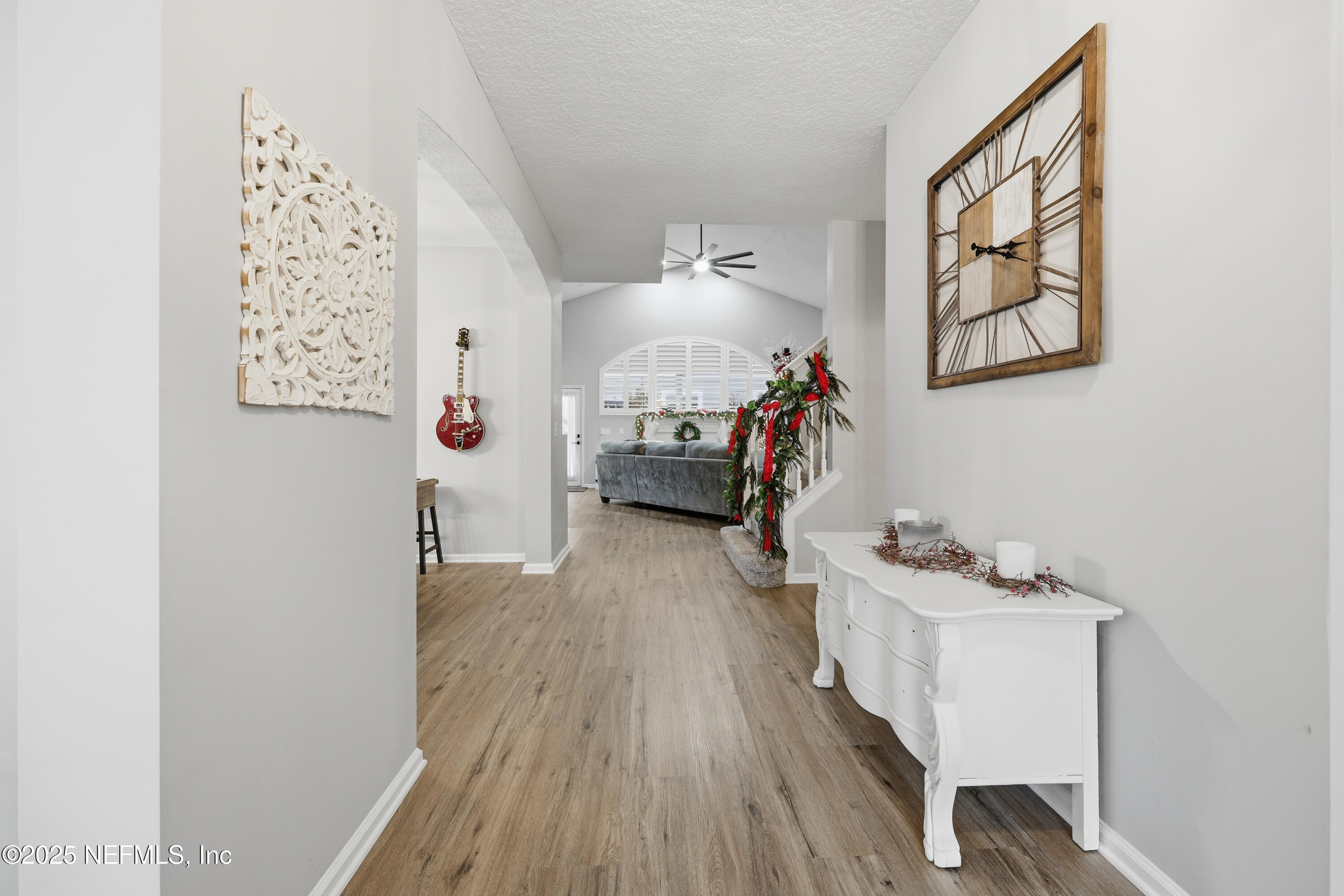 2301 Country Side Drive Fleming Island, FL 32003 - Photo 4 of 58 a room with furniture and wooden floor
