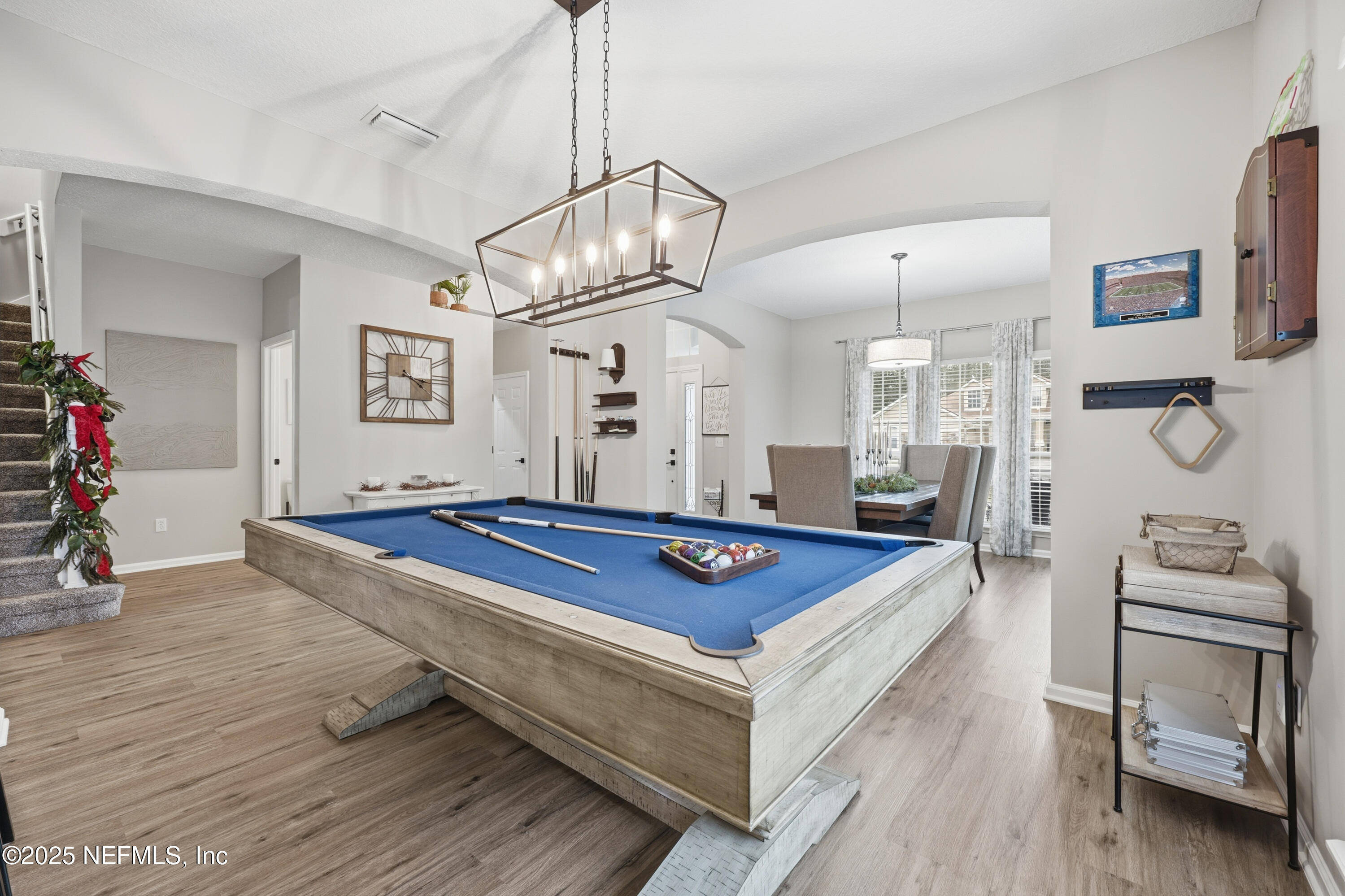 2301 Country Side Drive Fleming Island, FL 32003 - Photo 8 of 58 a room with furniture and wooden floor
