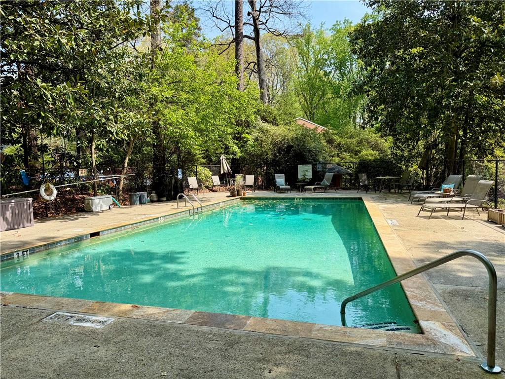 1010 Scott Boulevard, Unit E4 Decatur, GA 30030 - Photo 11 of 16 a view of a swimming pool with a patio