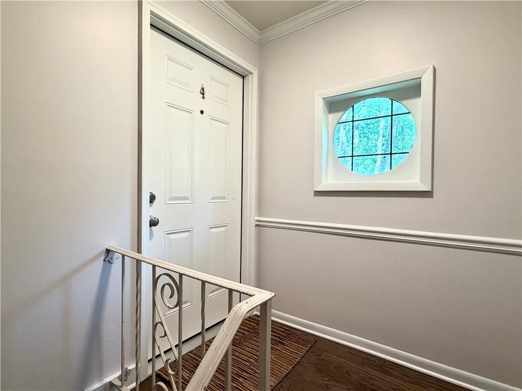 1010 Scott Boulevard, Unit E4 Decatur, GA 30030 - Photo 2 of 16 a view of an entryway with staircase