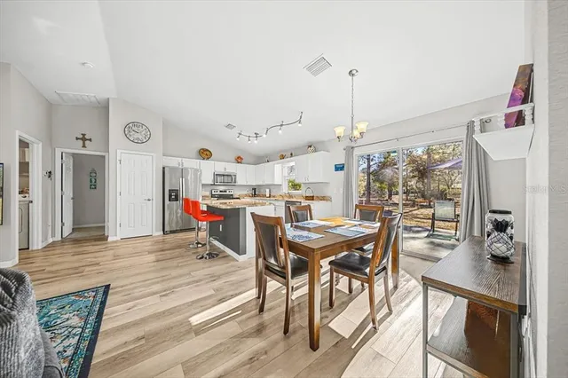 a view of a dining room with furniture