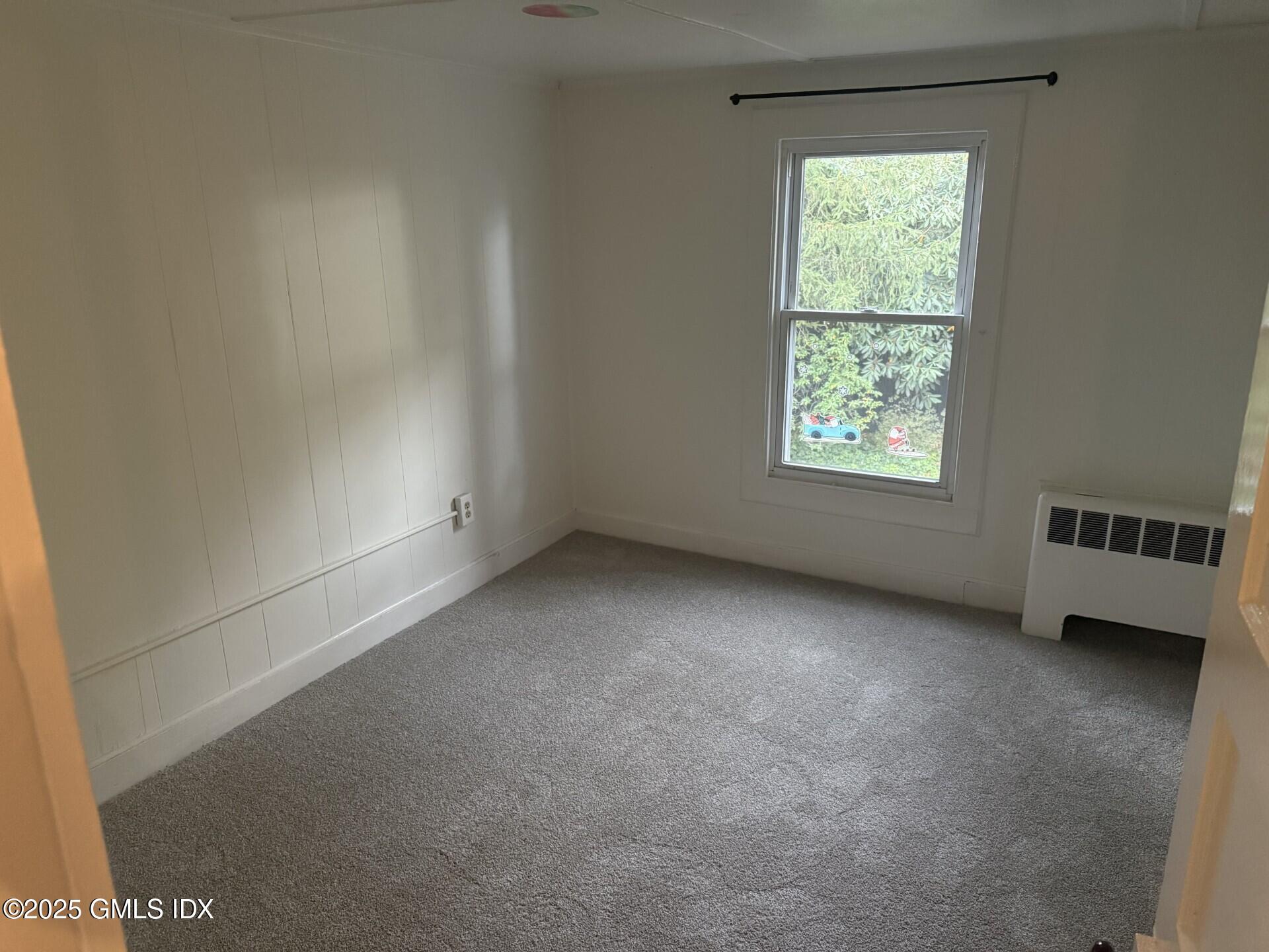 33 Parsonage Road Greenwich, CT 06830 - Photo 8 of 14 an empty room with a window