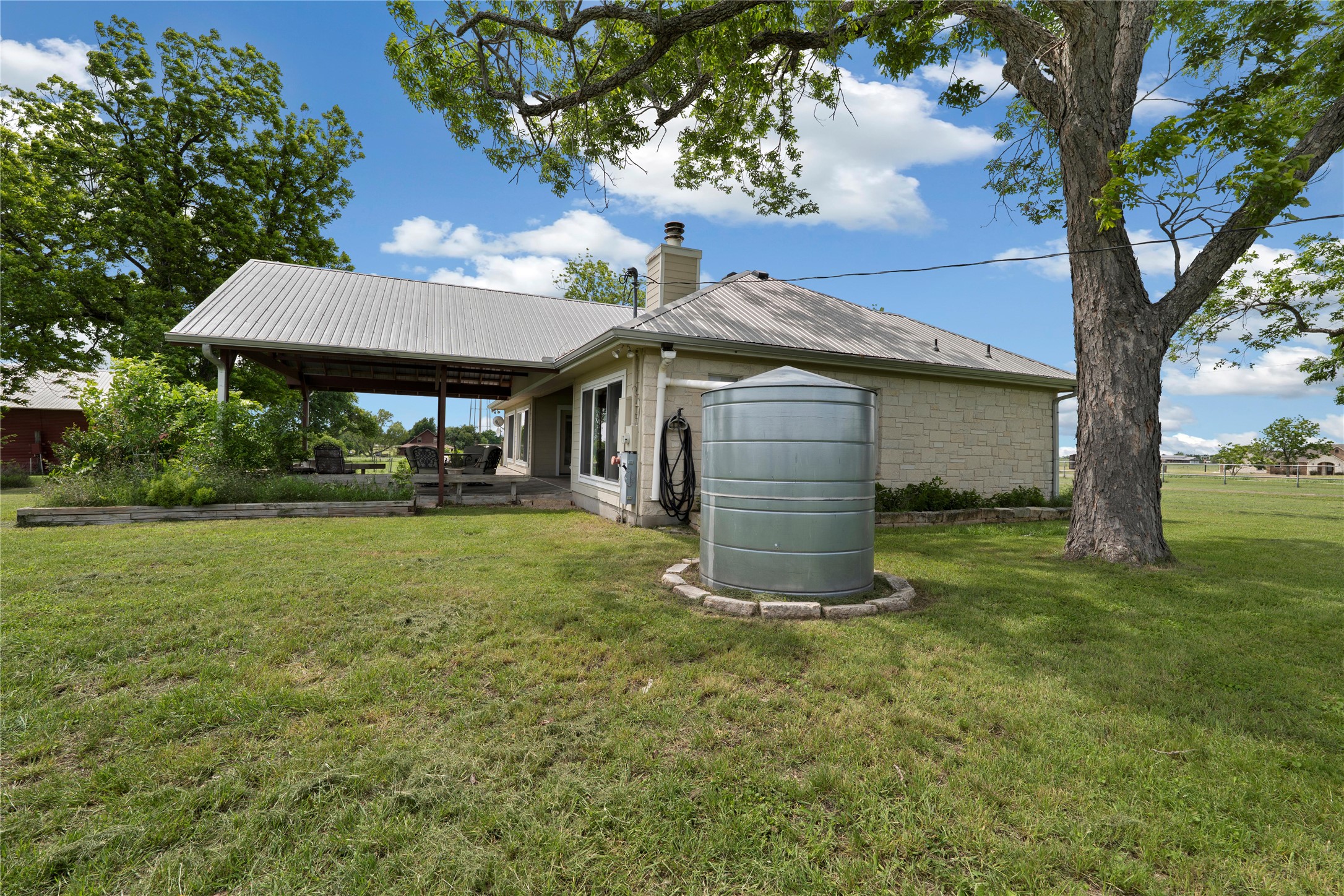 1005 East Buttercup Road Taylor, TX 76574 - Photo 9 of 38 a view of a house with a yard