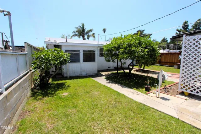 a house with garden in front of it