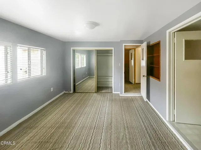 a view of wooden floor in an empty room