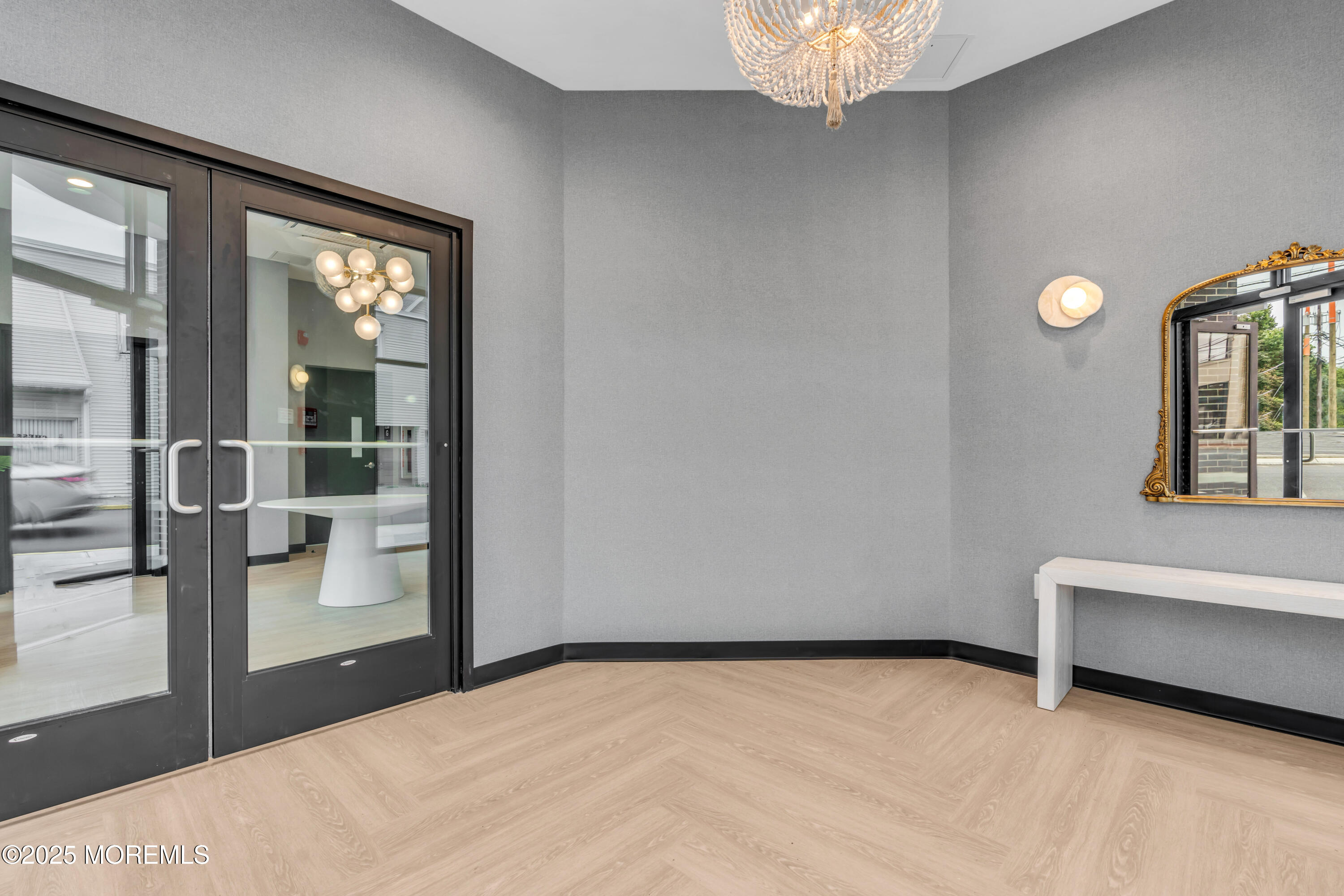 120 Monmouth Street, Unit RIVERS EDGE 307 Red Bank, NJ 07701 - Photo 28 of 38 a bedroom with a bed and a window