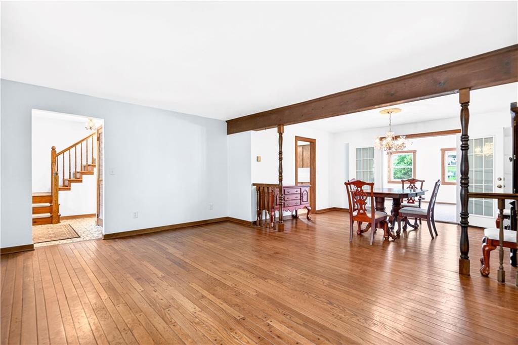 709 Vernon Drive Rostraver Township, PA 15012 - Photo 13 of 40 a view of a livingroom with furniture and wooden floor