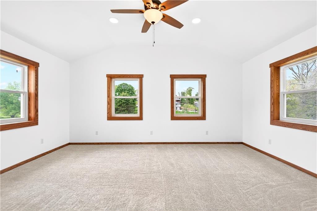 709 Vernon Drive Rostraver Township, PA 15012 - Photo 34 of 40 an empty room with windows and fan