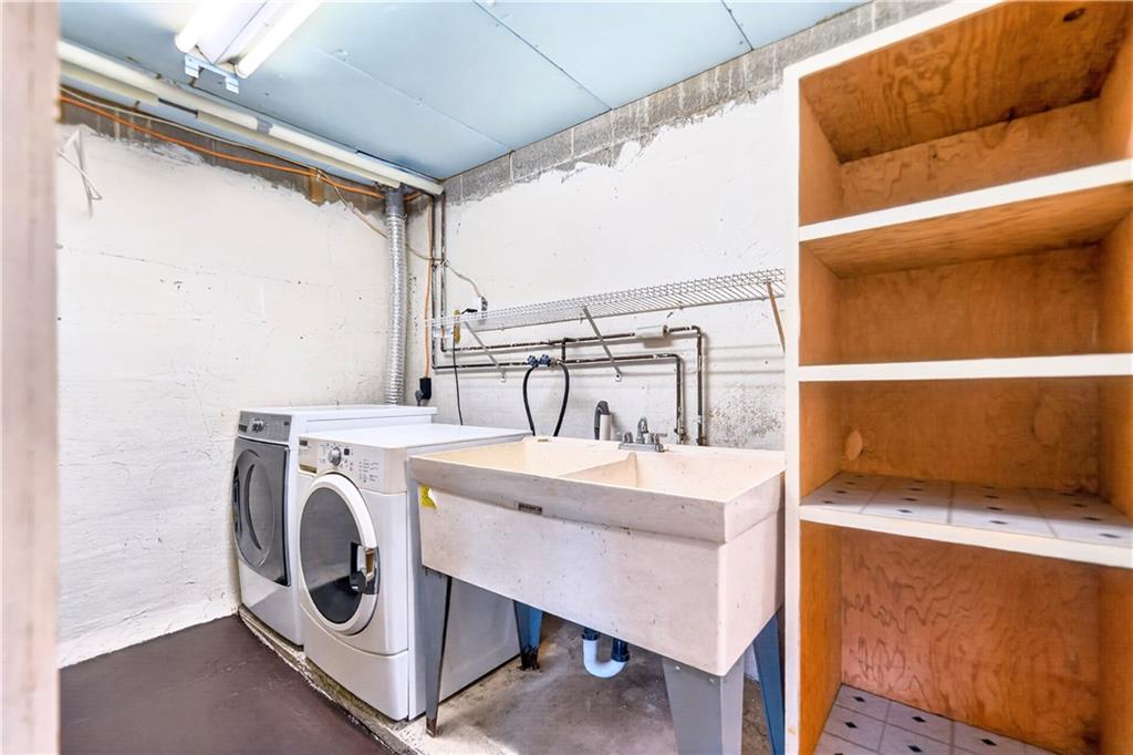 709 Vernon Drive Rostraver Township, PA 15012 - Photo 35 of 40 a utility room with dryer and washer