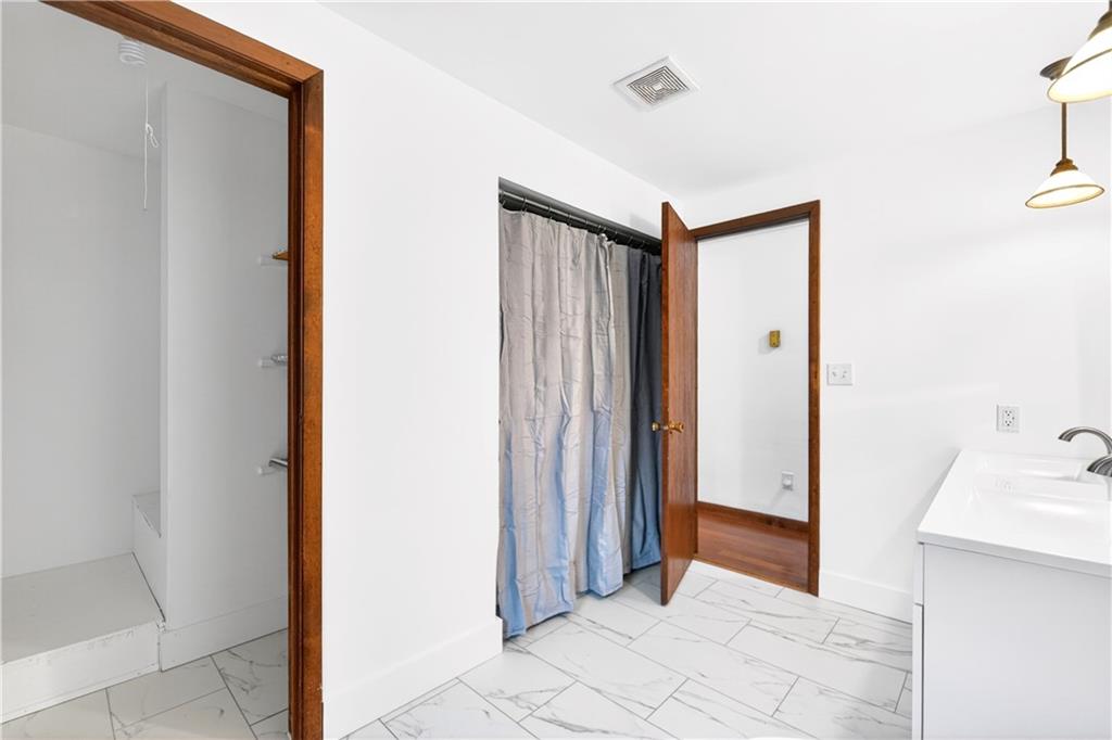 709 Vernon Drive Rostraver Township, PA 15012 - Photo 39 of 40 a view of a bathroom from the hallway