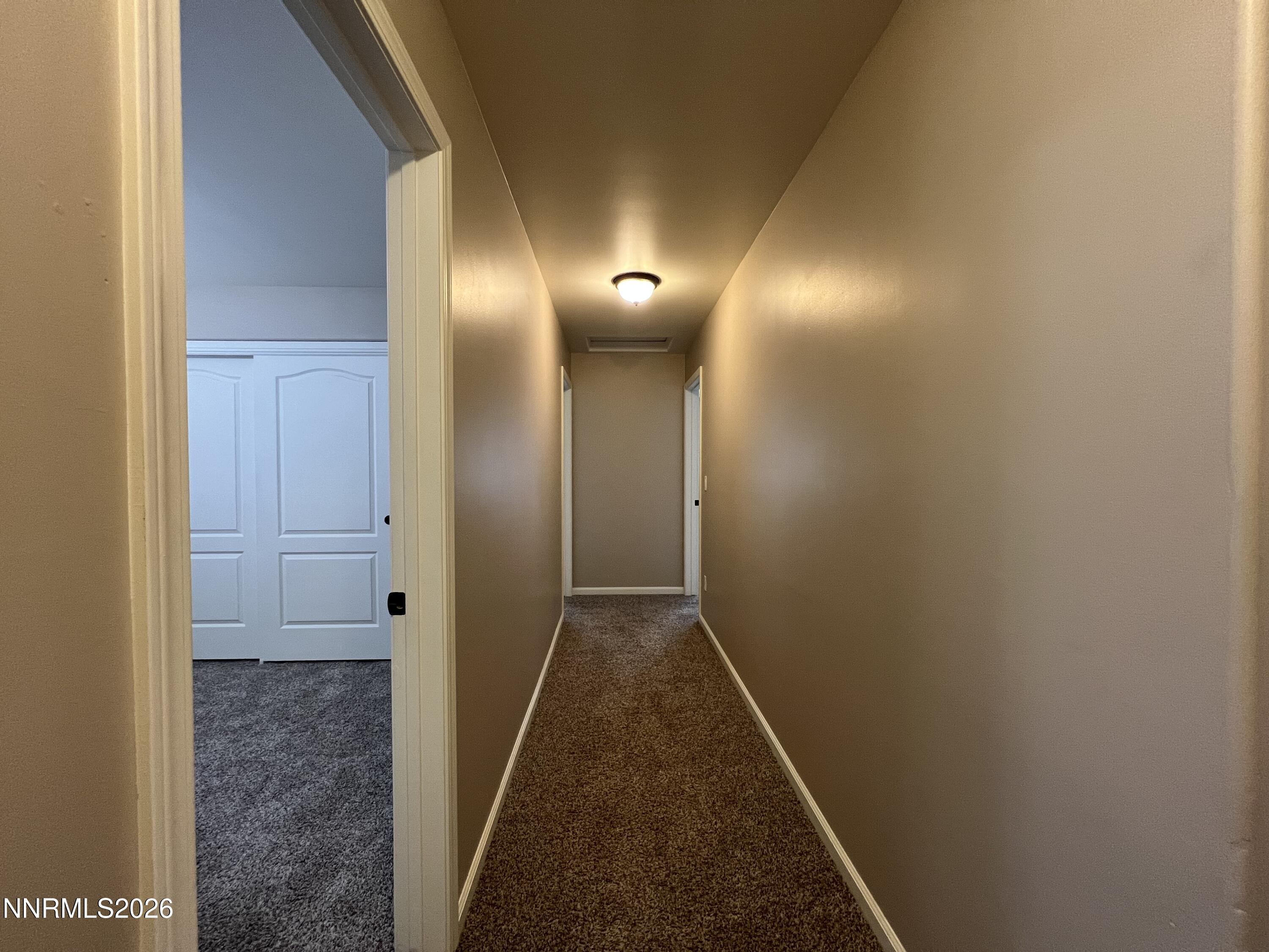 18406 Teddy Bear Court Reno, NV 89508 - Photo 32 of 44 a view of a hallway